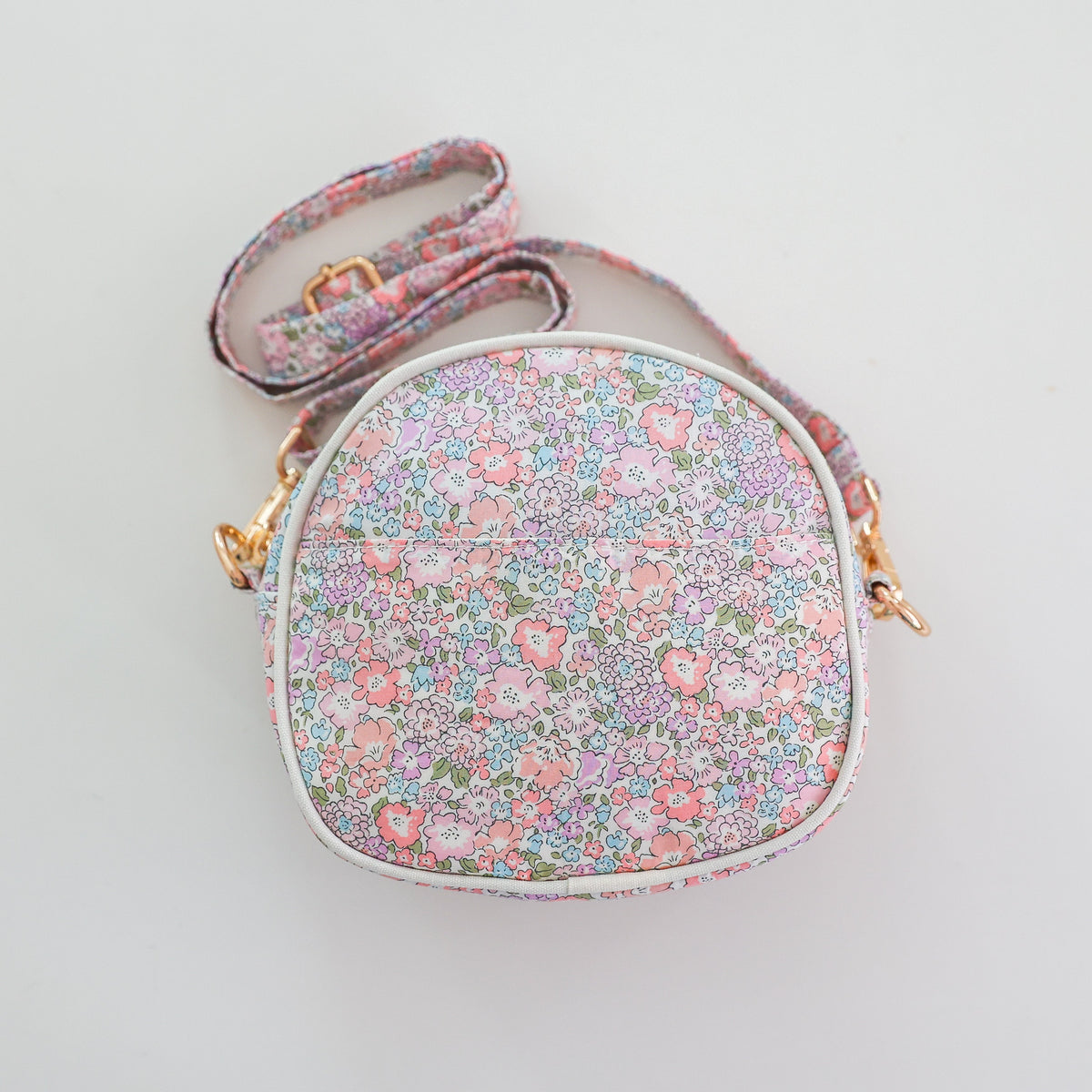 Josie Joan's Lillia round crossbody bag in Liberty London fabric