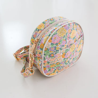 Josie Joan's Audrey round crossbody bag in Liberty London fabric
