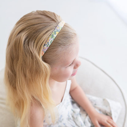 Girl wearing the Audrey Alice headband