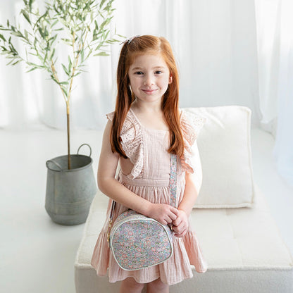 Girl wearing the Lillia crossbody bag across her body