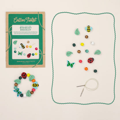 Minibeast bracelet kit contents with ladybird, bee and leaf wooden beads