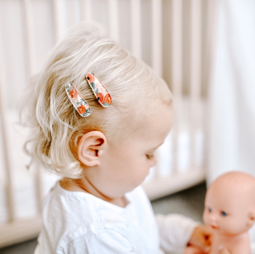Baby wearing Josie Joan's Little Anna hair clips